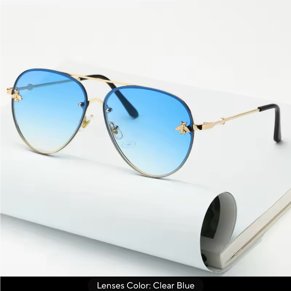 Fashionista, Blue sunglasses. Aviator style.